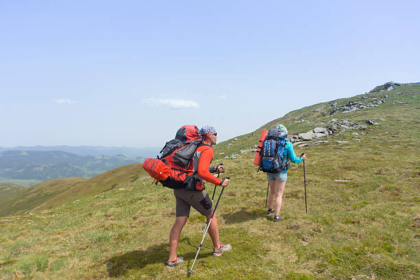 istock Summer hiking in the mountains with a backpack . 543695228