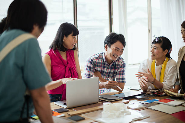 istock Team of interior designers discussing in the studio 543695234