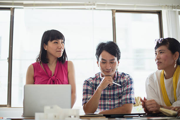 istock Team of interior designers discussing in the studio 543695626