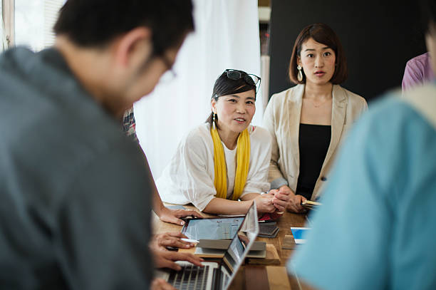istock Team of interior designers discussing in the studio 543695718