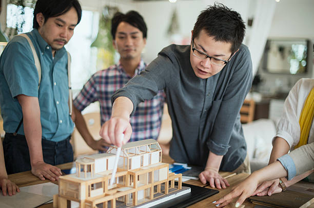 istock Team of interior designers discussing in the studio 543696218
