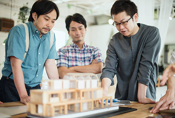 istock Team of interior designers discussing in the studio 543696434