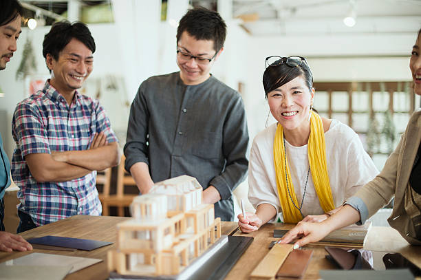 istock Team of interior designers discussing in the studio 543696596