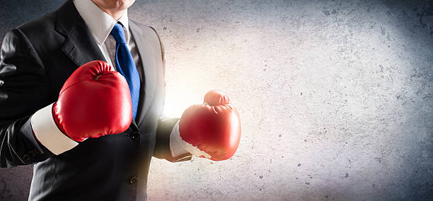 istock Businessman In Boxing Gloves 543698230