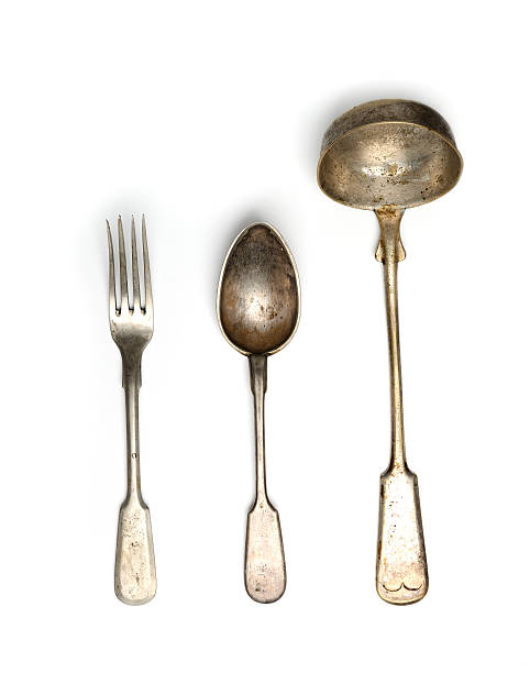 istock vintage scoop,spoon and fork on a white background 543698912