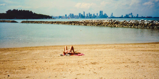 istock Tanning with Singapore in the distance 543699434