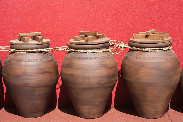 Three amphoras formerly used to carry wine or other products, traditional classic roman culture festival "Arde Lucus" in Lugo, Galicia, Spain.