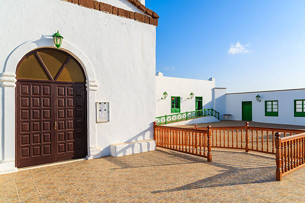 istock Church square and typical Canary style buildings 543803718