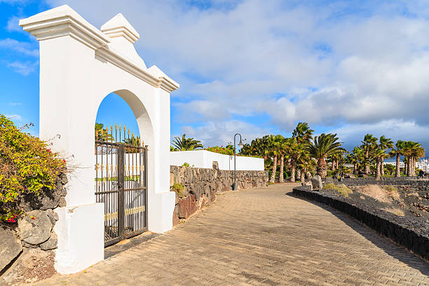 istock White gate to luxury hotel on coastal promenade 543805686