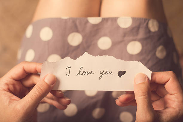 istock Woman holding a paper note with I love you 543806072