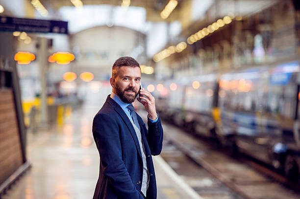 istock Hipster businessman with smartphone, making a phone call, platfo 543806166