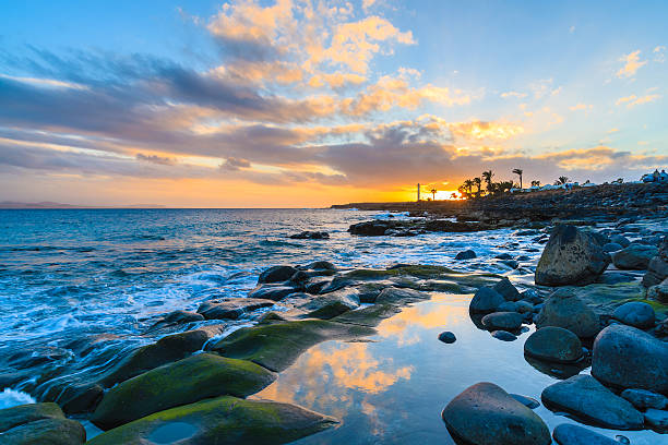 istock Sunset over ocean in Playa Blanca town 543807474