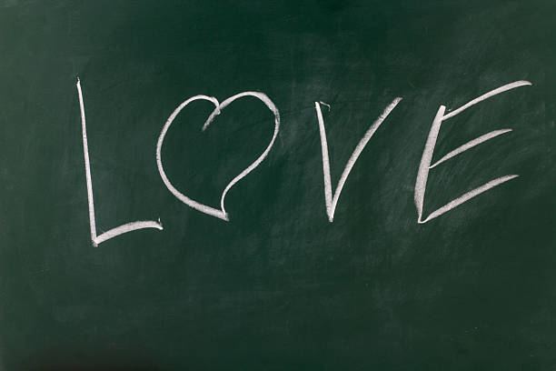 istock Close up of  word Love drawing on a blackboard. 543808998