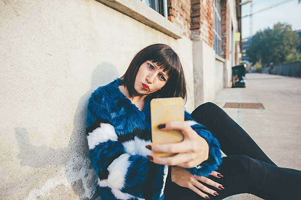 istock eastern woman with smart phone hand hold taking selfie 543811526