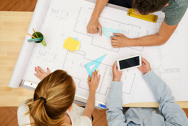 istock Architects planning in office. Aerial View 543812514