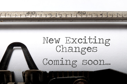 Exciting changes coming soon motivational saying printed on an old typewriter