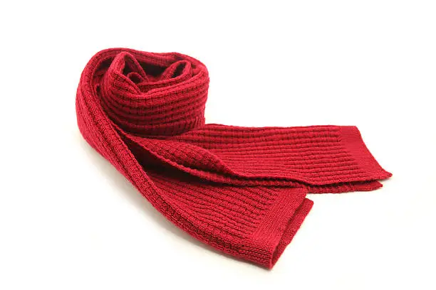 Wool knitted red scarf isolated on white background