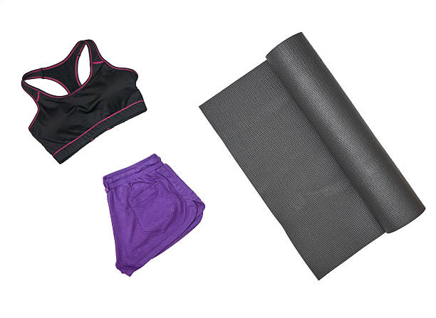 istock Woman's yoga outfit on white background 543816384