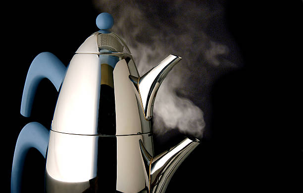 istock black and white shiny image of a tea pot 543816394