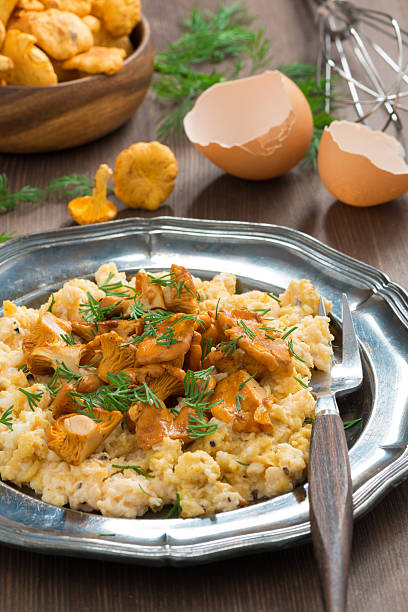 istock delicious scrambled eggs with chanterelles and fresh dill 543816824