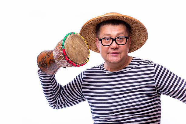 istock Old year singer dress like sailor with drum 543817382
