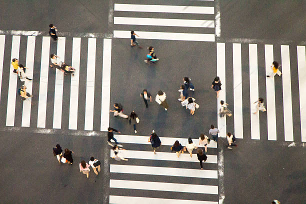 istock People crossing the road 543818662