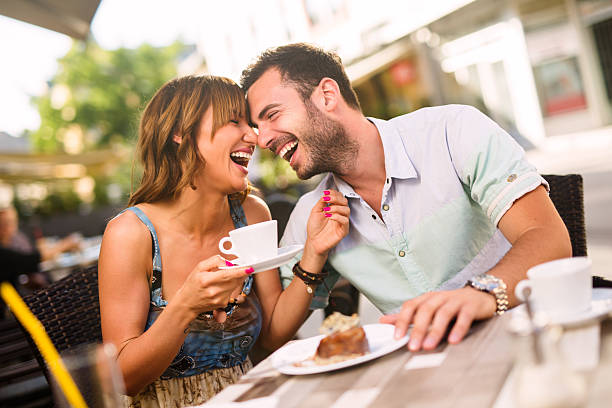 istock Lovely affectionate couple having fun together in a cafe. 543823270