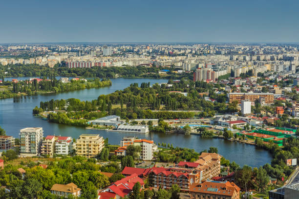 Aerial city view of Bucharest Northern Side Bucharest, Romania - August 16, 2013: Picturesque aerial view of the Tei Lake (Linden Tree Lake) and its neighborhood in the Bucharest Northern Side. bucharest stock pictures, royalty-free photos & images