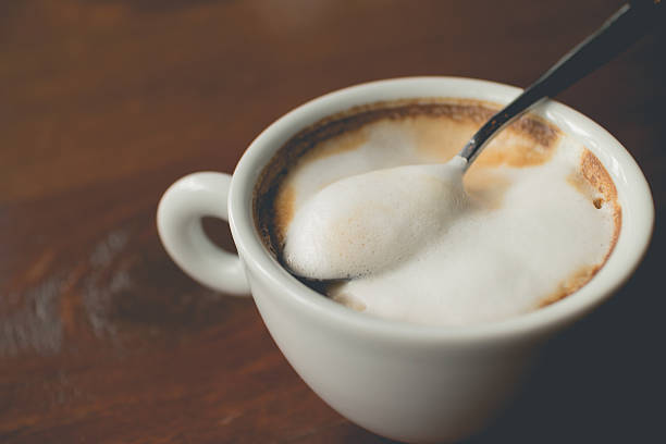 istock Coffee cup. Hot coffee with foam milk. Coffee break. 543826018