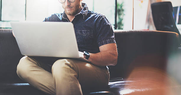 istock Successful Trade Broker working Laptop modern Interior Design Loft Office 543828322