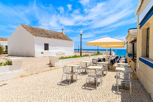 istock Church and restaurant  on coastal promenade 543828836