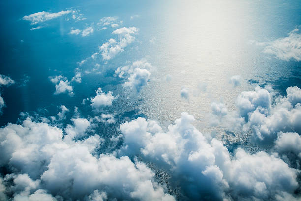 istock Clouds and sea aerial view as seen in window of 543831998