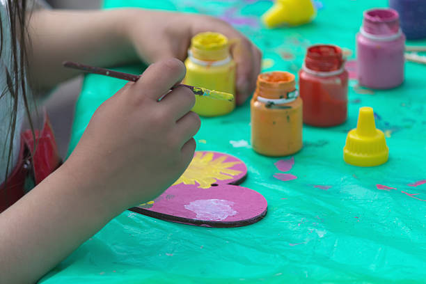 istock Hands of a child engaged in creativity 543833508