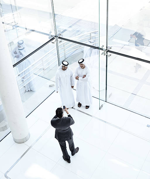 istock Three arab business men taking a picture 543835006