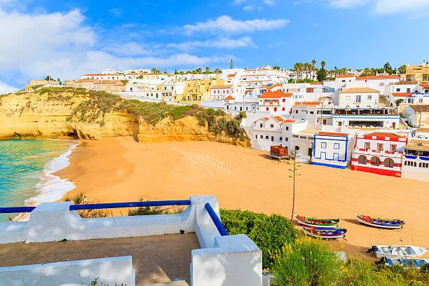 istock View of beach with colourful houses 543836488