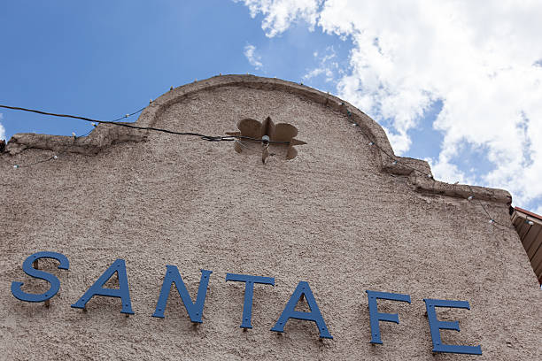 Santa Fe sign on sandstone building