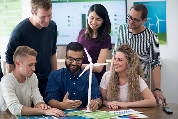 istock Looking at a Model Wind Turbine 543838660
