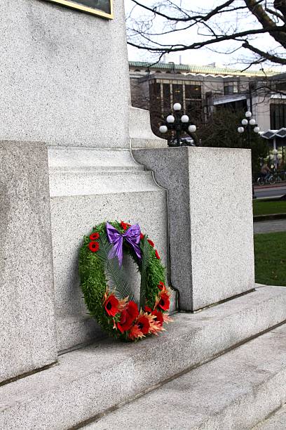 istock Flower Wreath At A War Memorial 543840790
