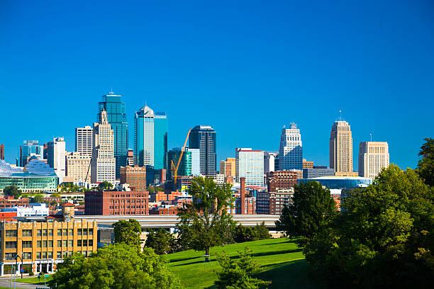 istock Kansas City Skyline with Park and Blue Sky 543841786