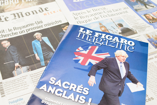 Antibes, France - July 2, 2016: French newspapers react to post-Brexit UK Political fallout. Le Monde and Figaro week-end editions' front pages cover the week's political upheaval in the UK following the Brexit vote: Brexit: United Kingdom looks for new prime minister (Le Monde); After Brexit, United Kingdom faces risk of breakup (Figaro).