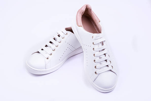 istock Women's sport shoes on white background 543973670