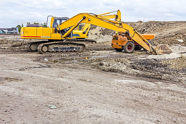 istock The group of construction machinery is parked at building site 543973846