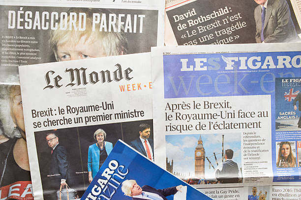 French newspapers react to post-Brexit UK Political fallout Antibes, France - July 2, 2016: French newspapers react to post-Brexit UK Political fallout. Le Monde and Figaro week-end editions' front pages cover the week's political upheaval in the UK following the Brexit vote: Brexit: United Kingdom looks for new prime minister (Le Monde); After Brexit, United Kingdom faces risk of breakup (Figaro). front page stock pictures, royalty-free photos & images