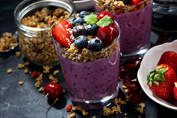 istock healthy dessert with fresh berries and granola 543975916