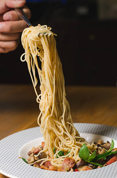 istock Hot and spicy spaghetti with chopstick 543978382