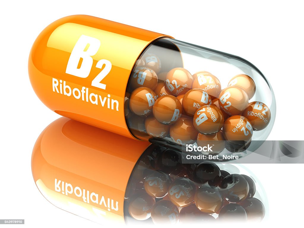 Vitamin B2 capsule. Pill with riboflavin. Dietary supplements. Vitamin B2 capsule. Pill with riboflavin. Dietary supplements. 3d illustration Nutritional Supplement Stock Photo