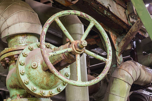 istock Industrial valve in an abandoned factory. 543979862