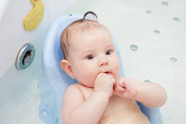 istock Newborn baby bathe and swim 543984436