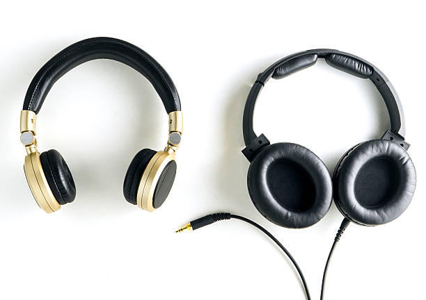 istock wireless headphone and black wired head phone on white background. 543986752