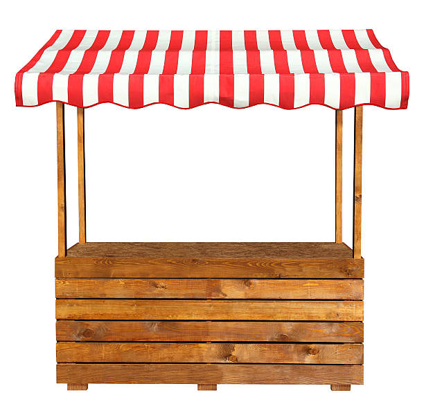 Wooden market stand stall with red white striped awning This is an empty wooden stall stand with red white awning. market stall stock pictures, royalty-free photos & images